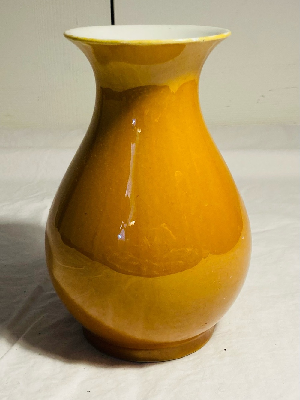 Small Chinese porcelain plum shape vase in burnt orange off white interior